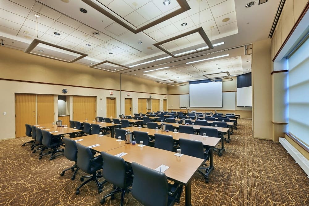 Executive Conference Room at the Penn Stater with Projector screen down